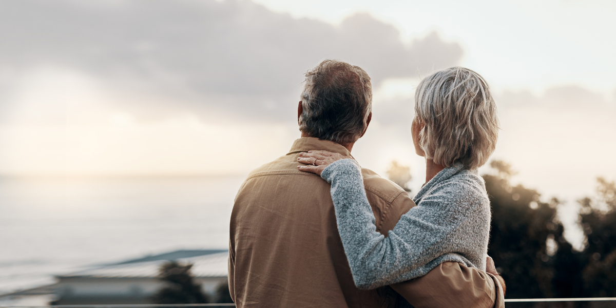 Mature couple at sunset, enjoying life with peace of mind